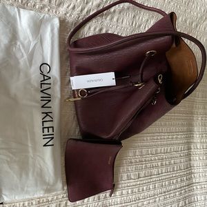 Calvin Klein reversible drawstring bucket bag.